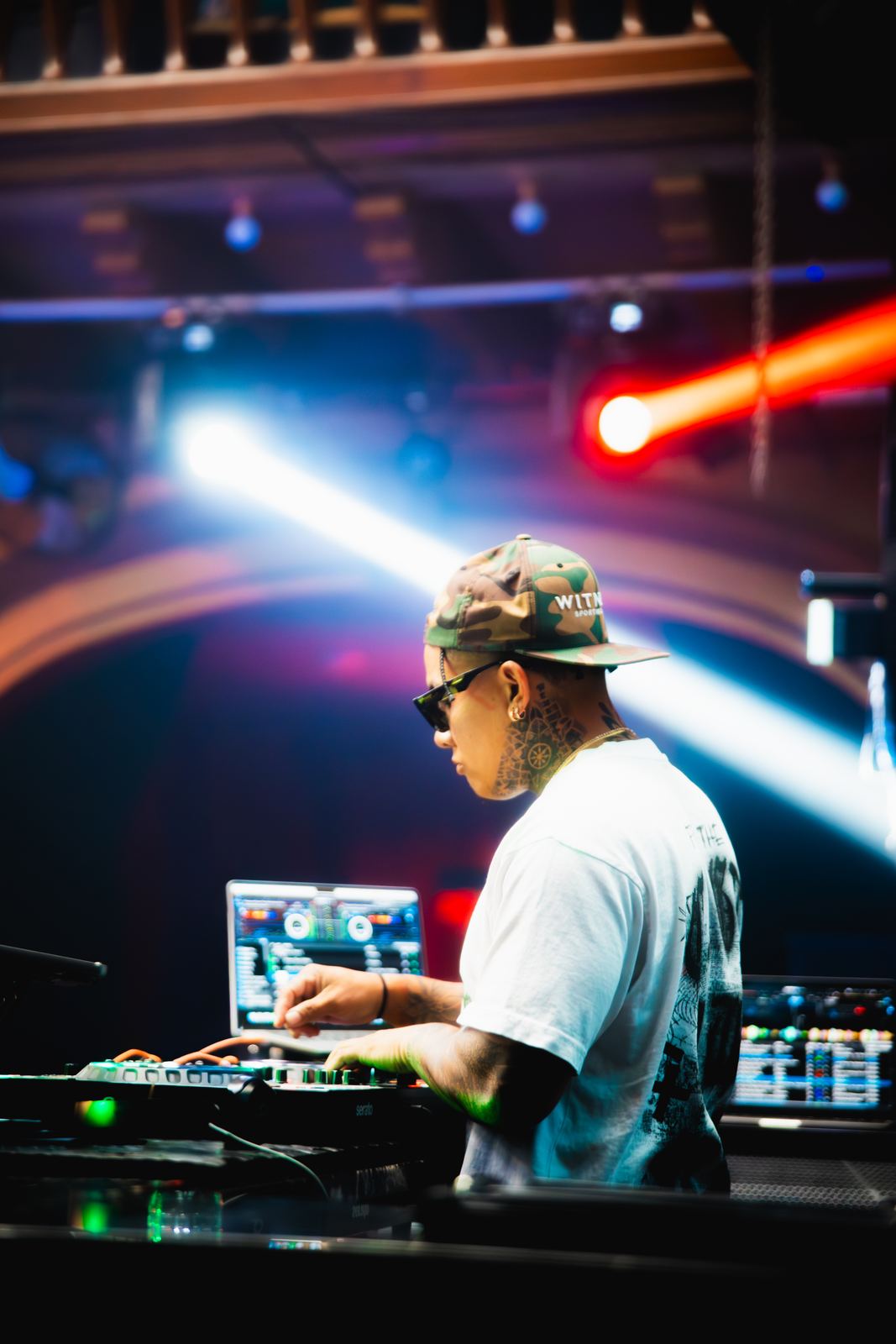 DAVINCII on a festival stage under light beams